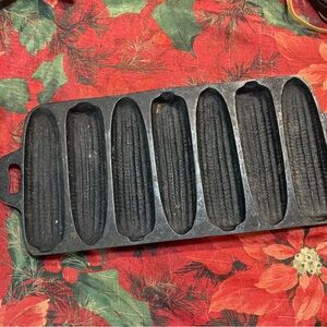 cast iron cornbread pan designed to bake corncob-shaped sticks
